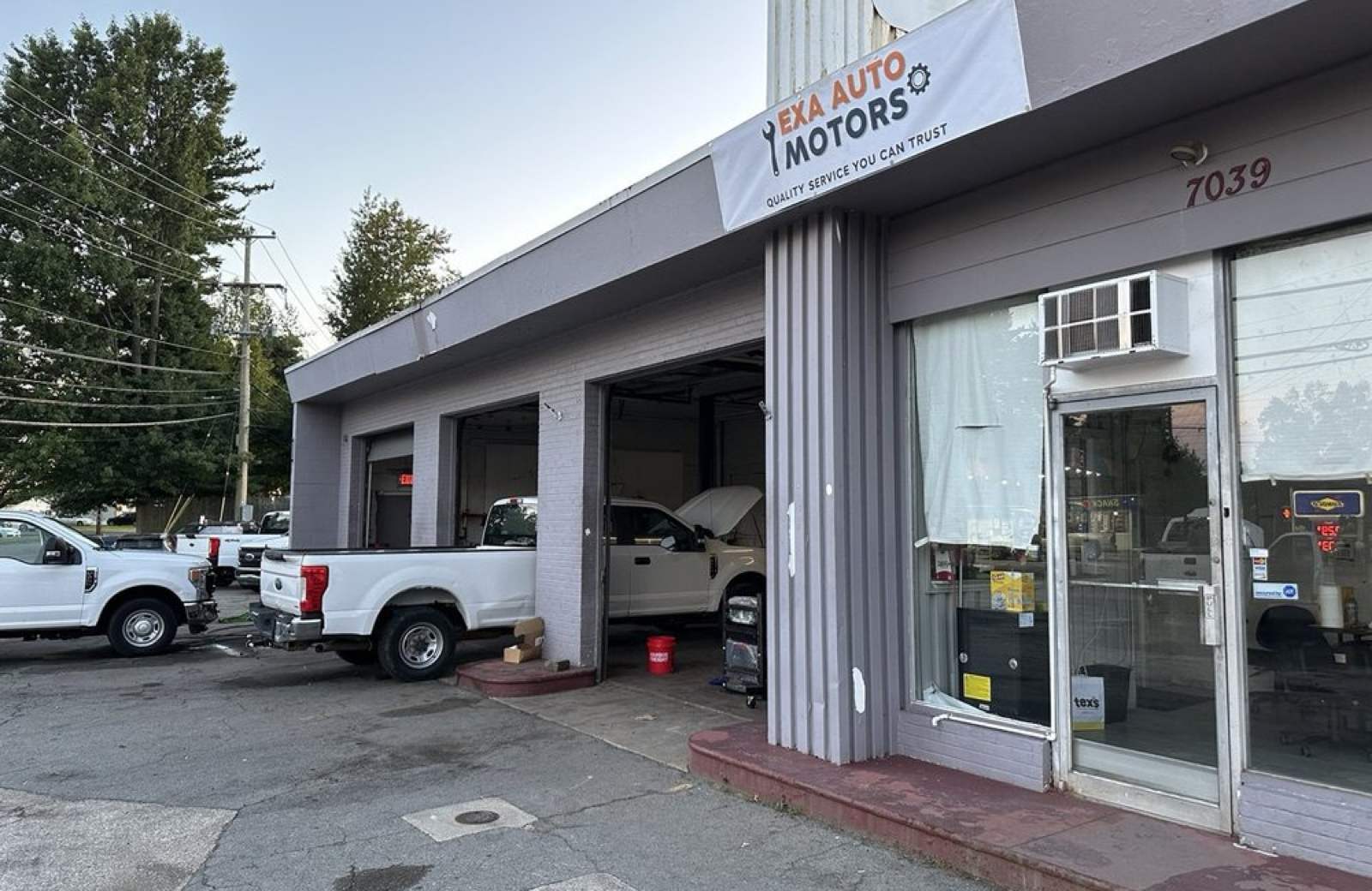 The EXA Auto Motors entrance and service bays at 7039 Mill Creek Rd, Levittown, PA 19057